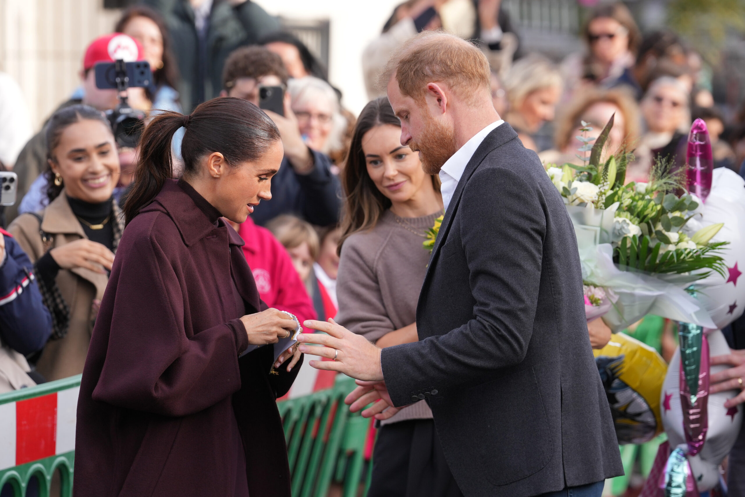 Prince Harry and Meghan cheered as they make first joint appearances since returning to UK